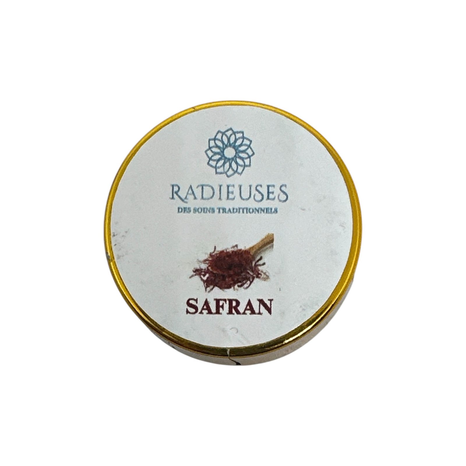 Boîte ronde de safran pur et authentique de la marque Radieuses, montrant les stigmates de safran de haute qualité.